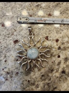 Silver Plated Sunburst Larimar Pendant - Light Blue Gemstone